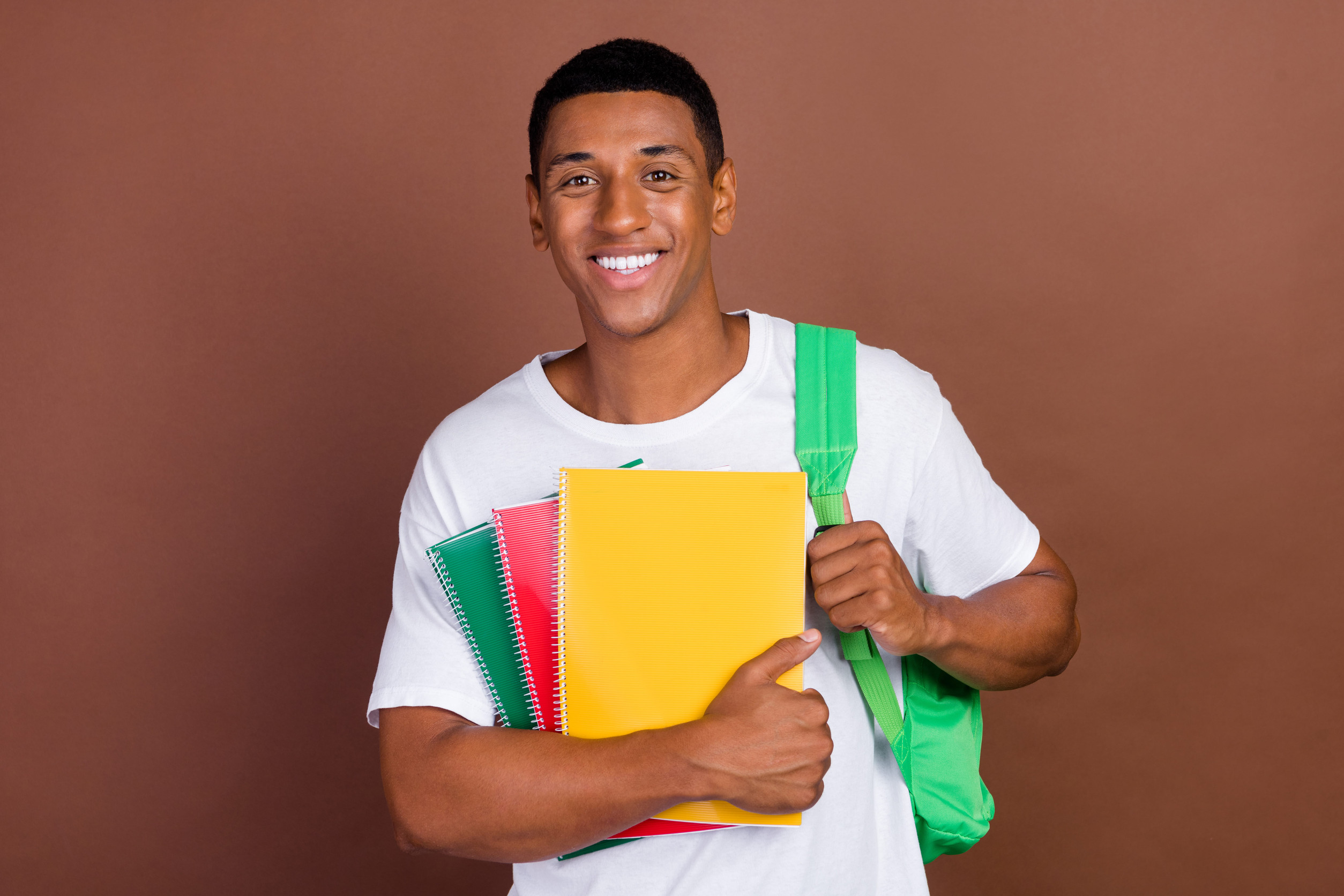 A Student Holding Books