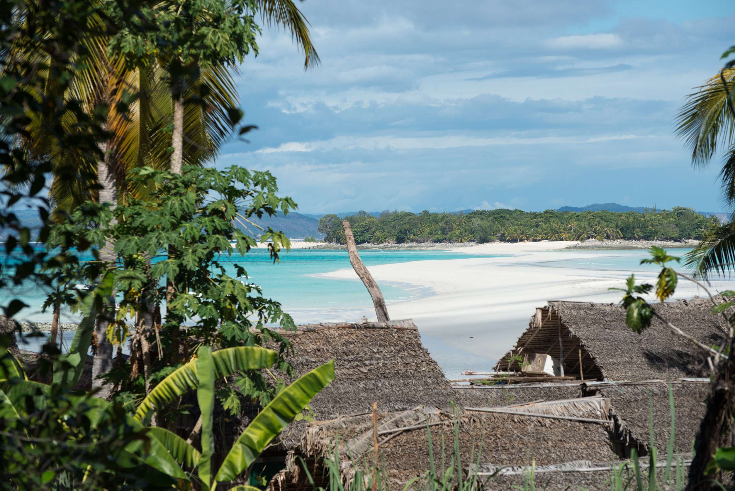 Beach Huts Next To A Beach In Nosy Be