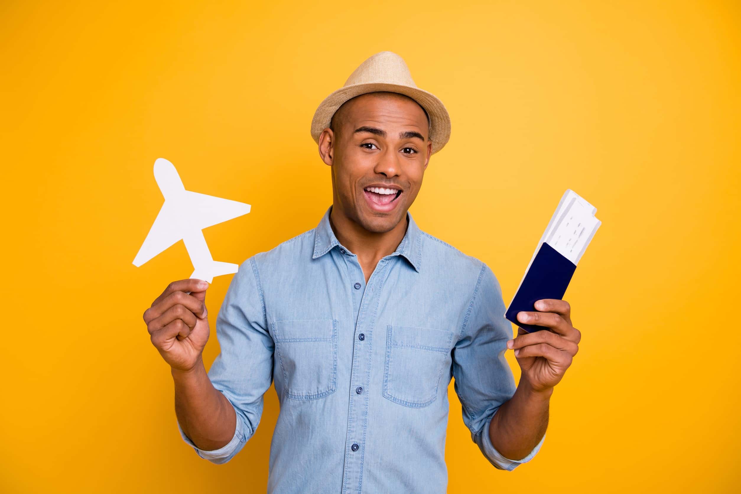 Hold Hand Paper Plane And Passports