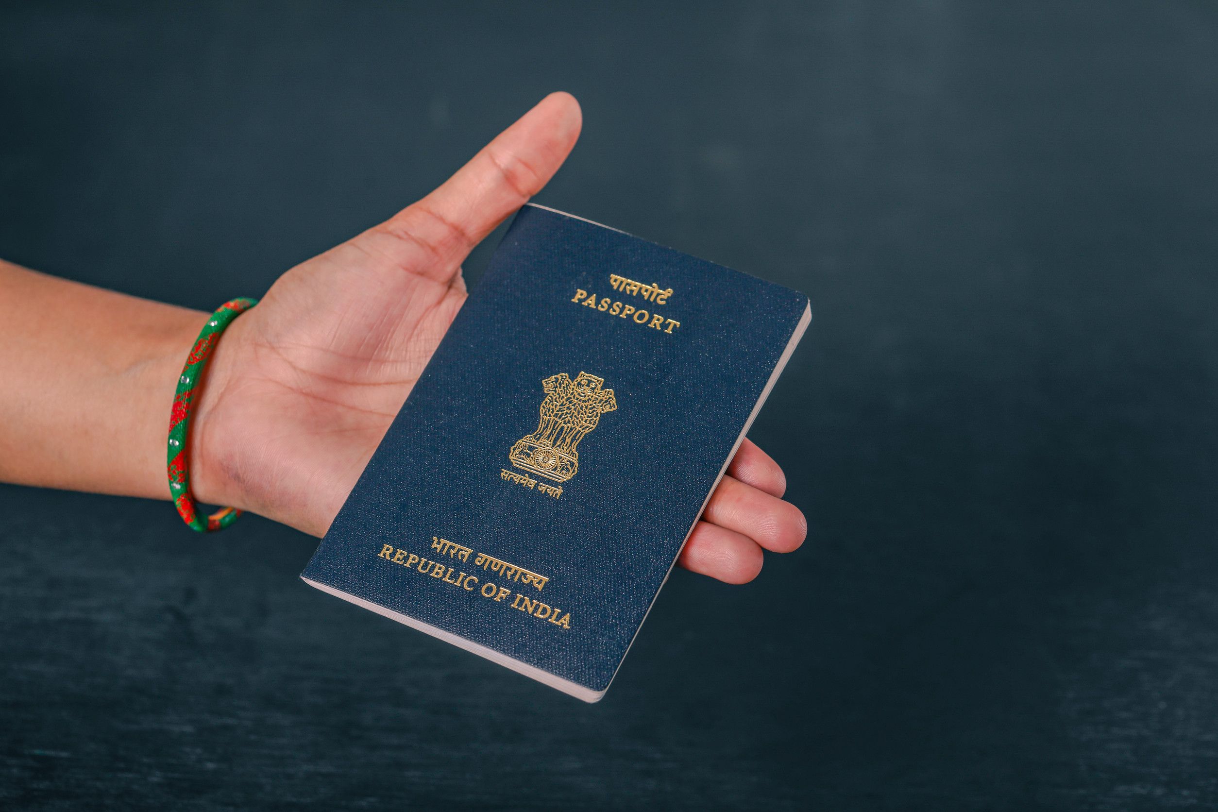 Indian Passport In Hand Showing Passport Indian Passport In Hand Showing Passport