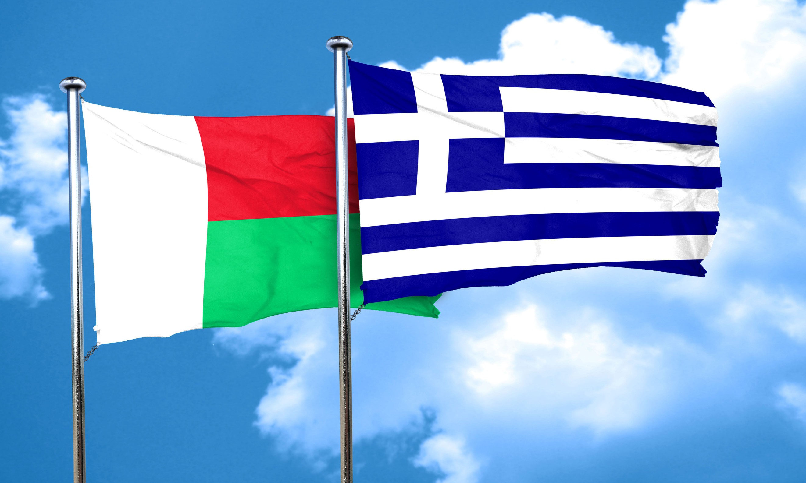 Madagascar And Greece Flags Waving