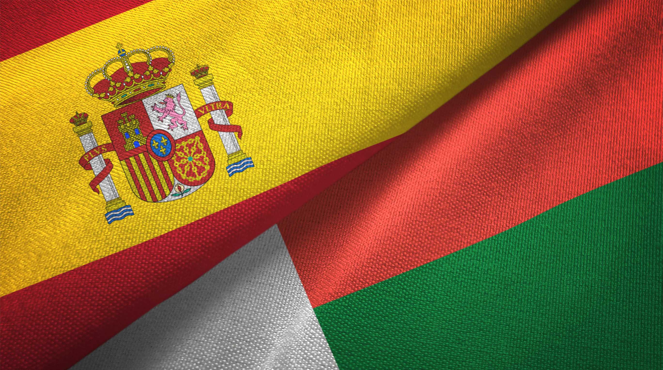 Madagascar And Spain Flags Together 