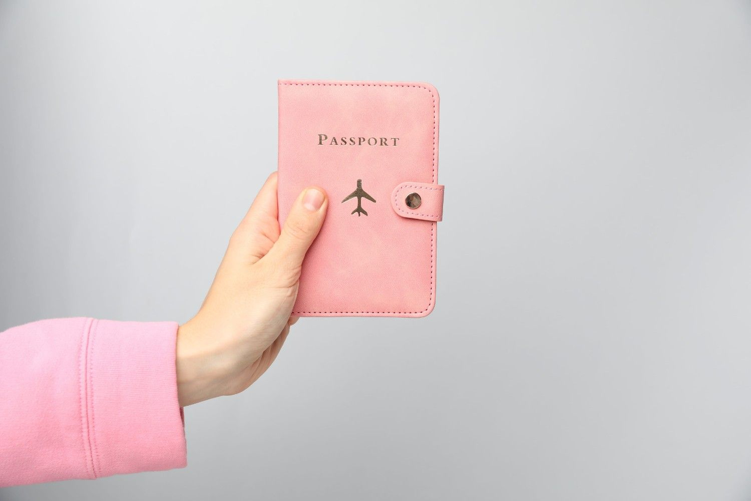 Woman Holding A Passport
